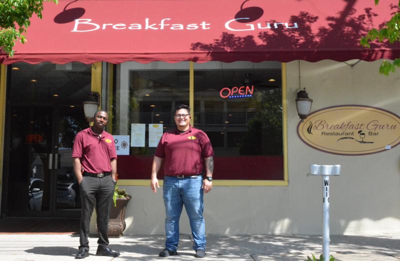 Breakfast Guru owner Dennis Kanzayi (left) and general manager Luis Contreras in front of the new Wilmington Avenue business. CHRIS FLOOD PHOTO